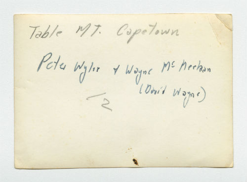 Peter Wiley and Wayne McMeekan on the top of Table Mountain in Cape Town, South Africa. Verso