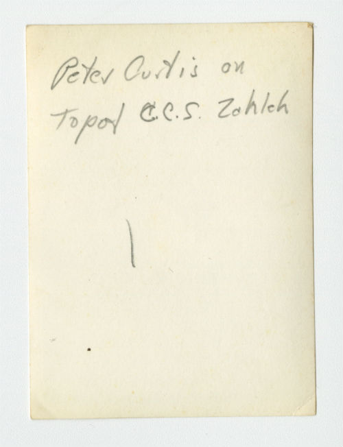 Peter Curtis on the roof of the Casualty Clearing Station in Zahleh, Lebanon. Verso 1