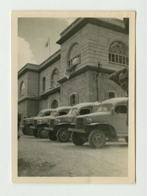 Ambulances in front of the Casualty Clearing Station in Zahleh, Lebanon. Recto