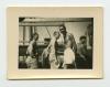 AFS volunteers sunbathing on the SS El Nil. Contact Print Recto