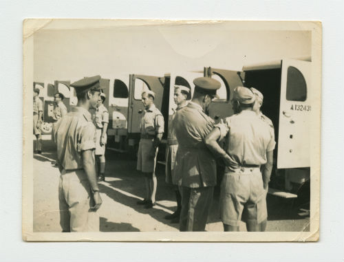Inspection with newly-delivered ambulances at  the El Tahag Mobilization Camp, Egypt. Recto