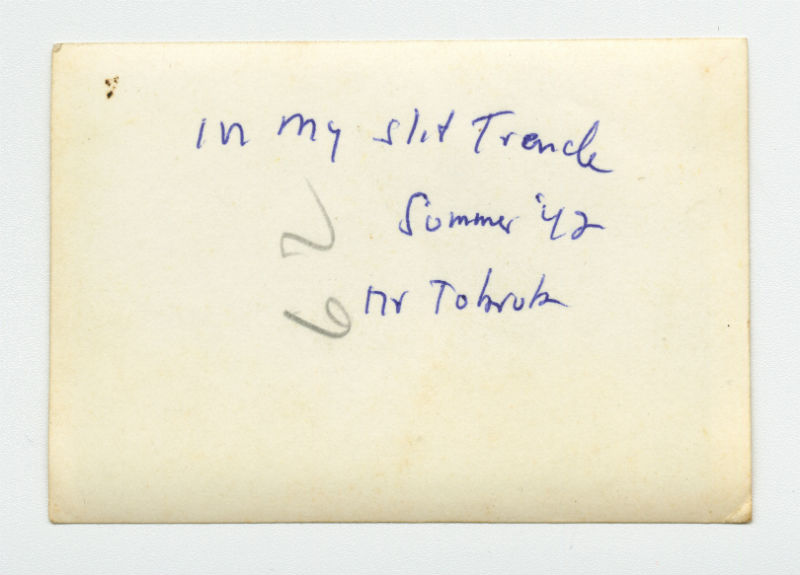 Arthur Howe, Jr. in his slit trench near Tobruk, Libya. Verso