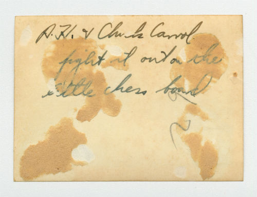 Arthur Howe, Jr. playing chess with Charles "Chuck" Carroll near Tobruk, Libya. Verso 1