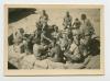 Distributing the spoils of war during the retreat from Tobruk, Libya. Recto