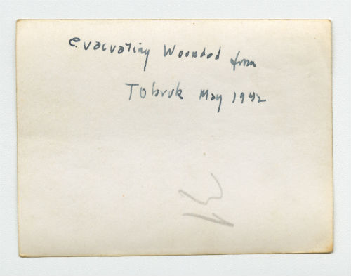 Evacuating the wounded from Tobruk, Libya. Verso