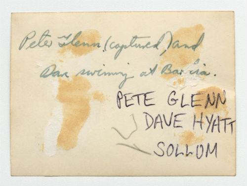 Peter Glenn and Dave Hyatt swimming at Bardia, Libya. Verso