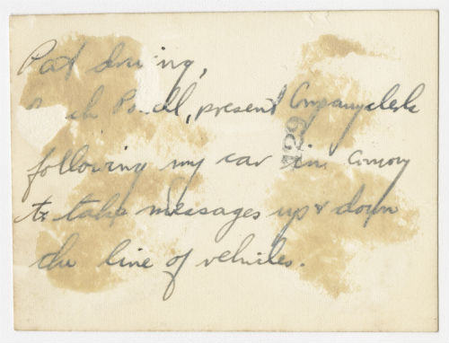Charles Beach Powell and Edwin "Pat" Fiero following Arthur Howe Jr.'s car in convoy. Verso