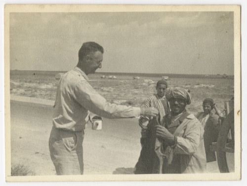 Erwin "Pat" Fiero makes a deal with some locals. Recto