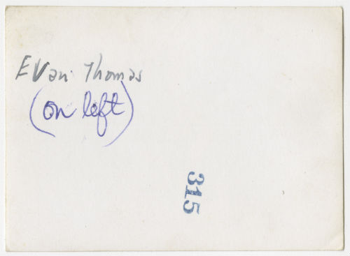 Evan Thomas (on the left) and two unidentified individuals. Verso