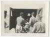 Men loading a stretcher on an ambulance