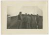 Paul "Tiny" Herbert and other members of Section 3 at El Tahag Mobilization Camp. Recto