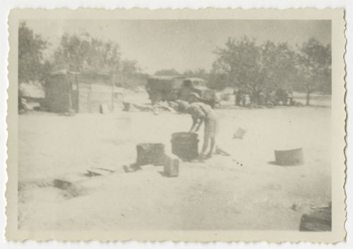 Undidentified individual in a camp