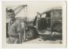 Unidentified individual near a vehicle