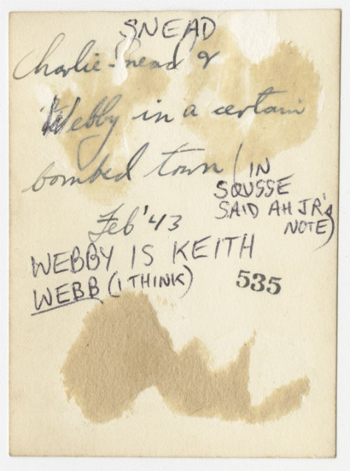 Charles "Charlie" Snead and "Webby" in the bombed town of Sousse, Tunisia. Verso
