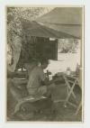 James Andrews writing letters home from the AFS Headquarters in Tunisia. Recto