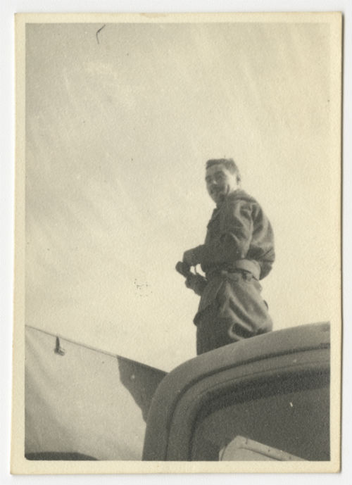 "Webby" standing on a vehicle. Recto