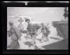 Unidentified individuals and an ambulance
