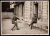 Two men on the terrace at 21 Rue Raynouard