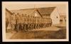 Men lined up outside the barracks at the Officers' Training School at Meaux