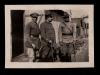 A. Piatt Andrew (left) with two unidentified men